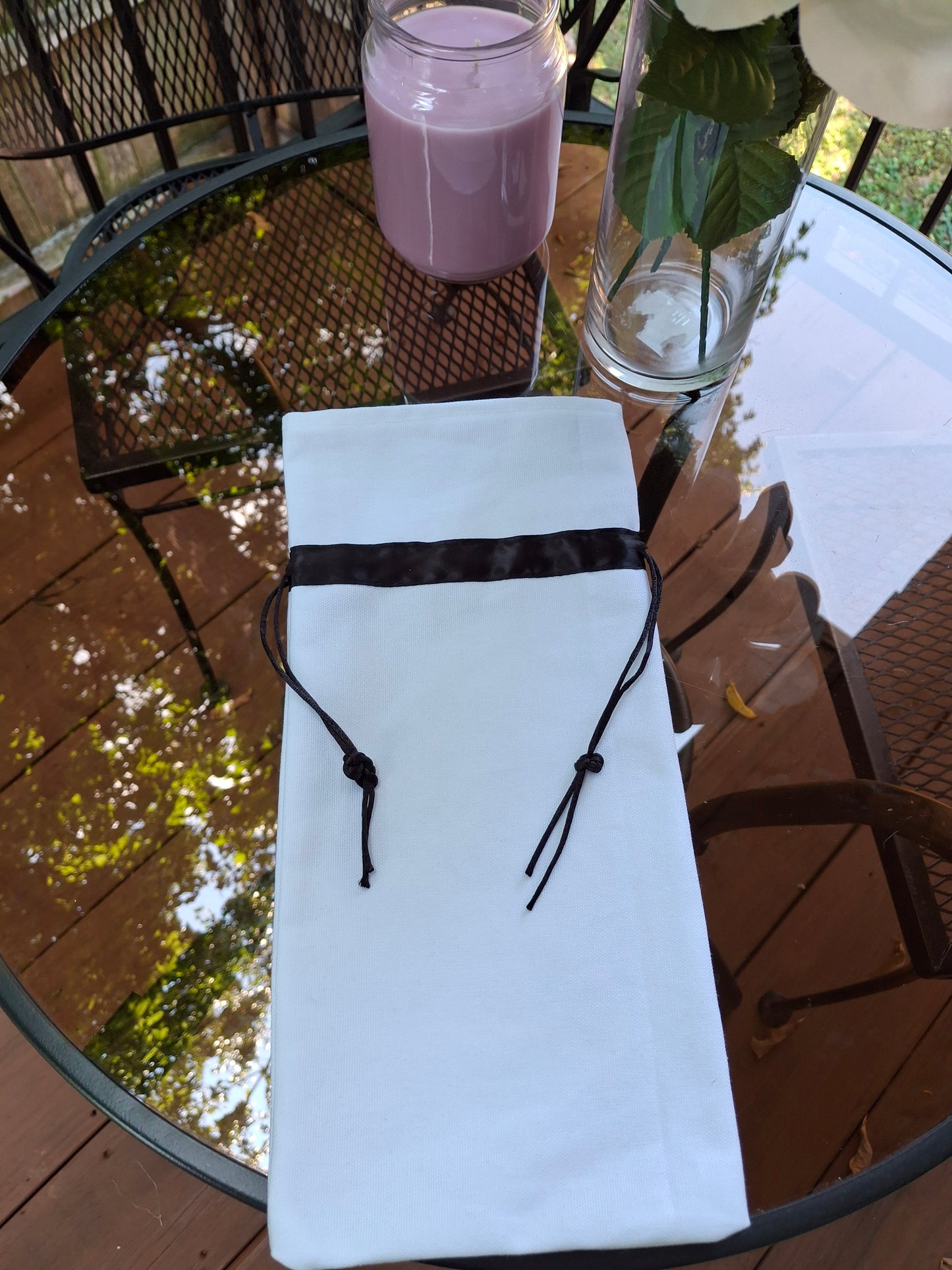 White canvas wine gift bag with black drawstring ribbon, customizable for gifts and special occasions
